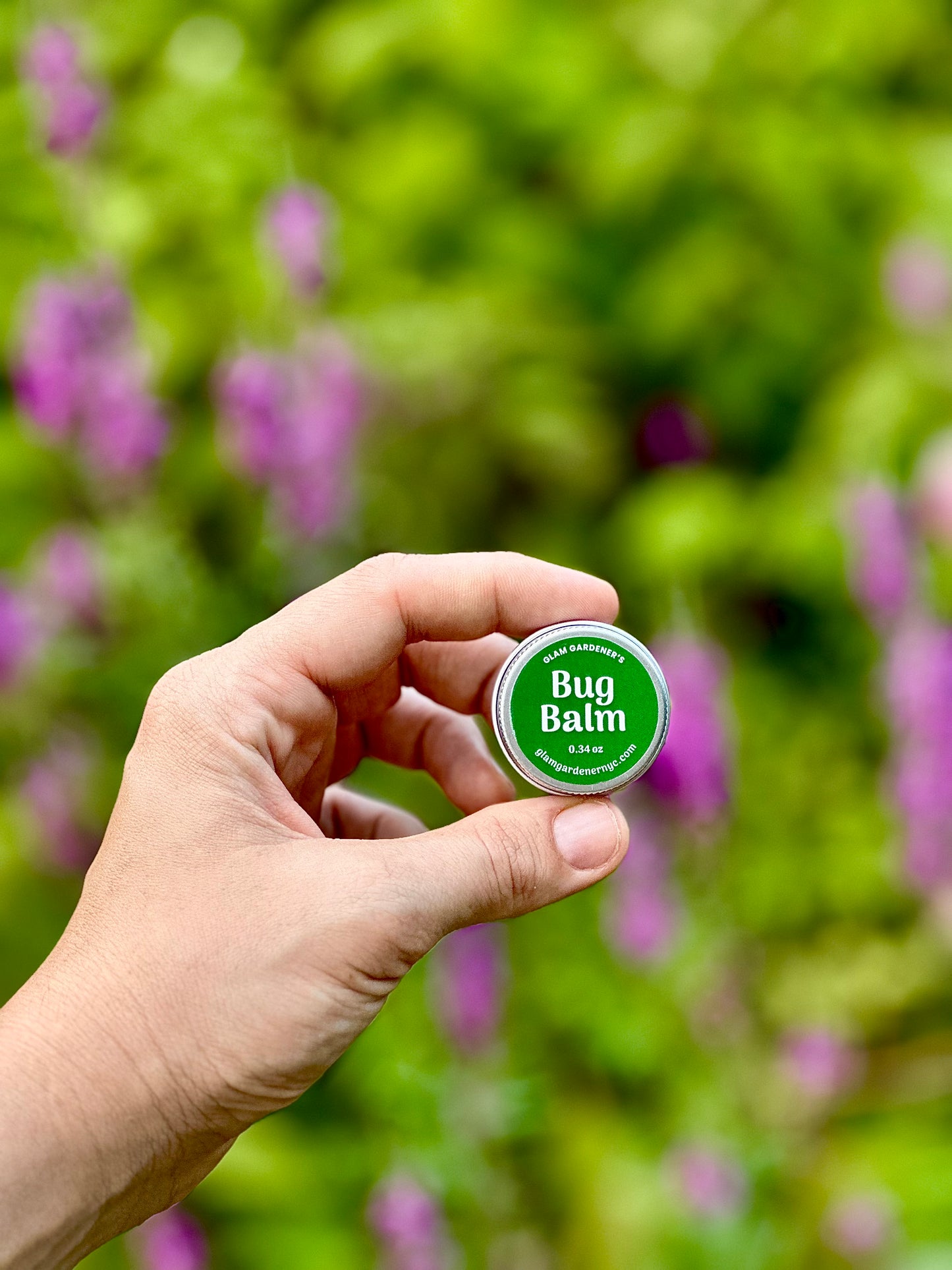 Miniature Bug repelling balm by Glam Gardener in small metal tin with green color.