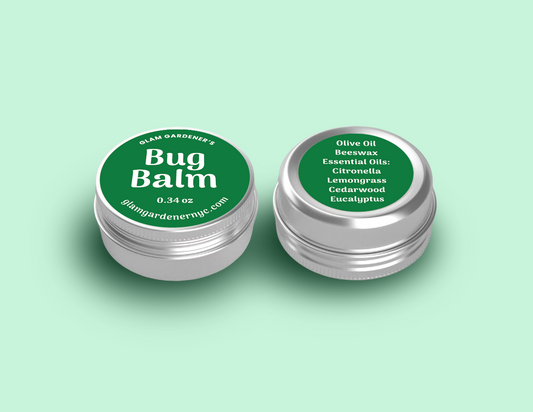 Glam Gardener's Bug Balm is 0.34 ounces of a natural bug repelling salve with Olive Oil, beeswax, citronella essential oil, lemongrass essential oil, cedarwood essential oil, and eucalyptus essential oil. The label is green and it comes in a small sized aluminum tin.
