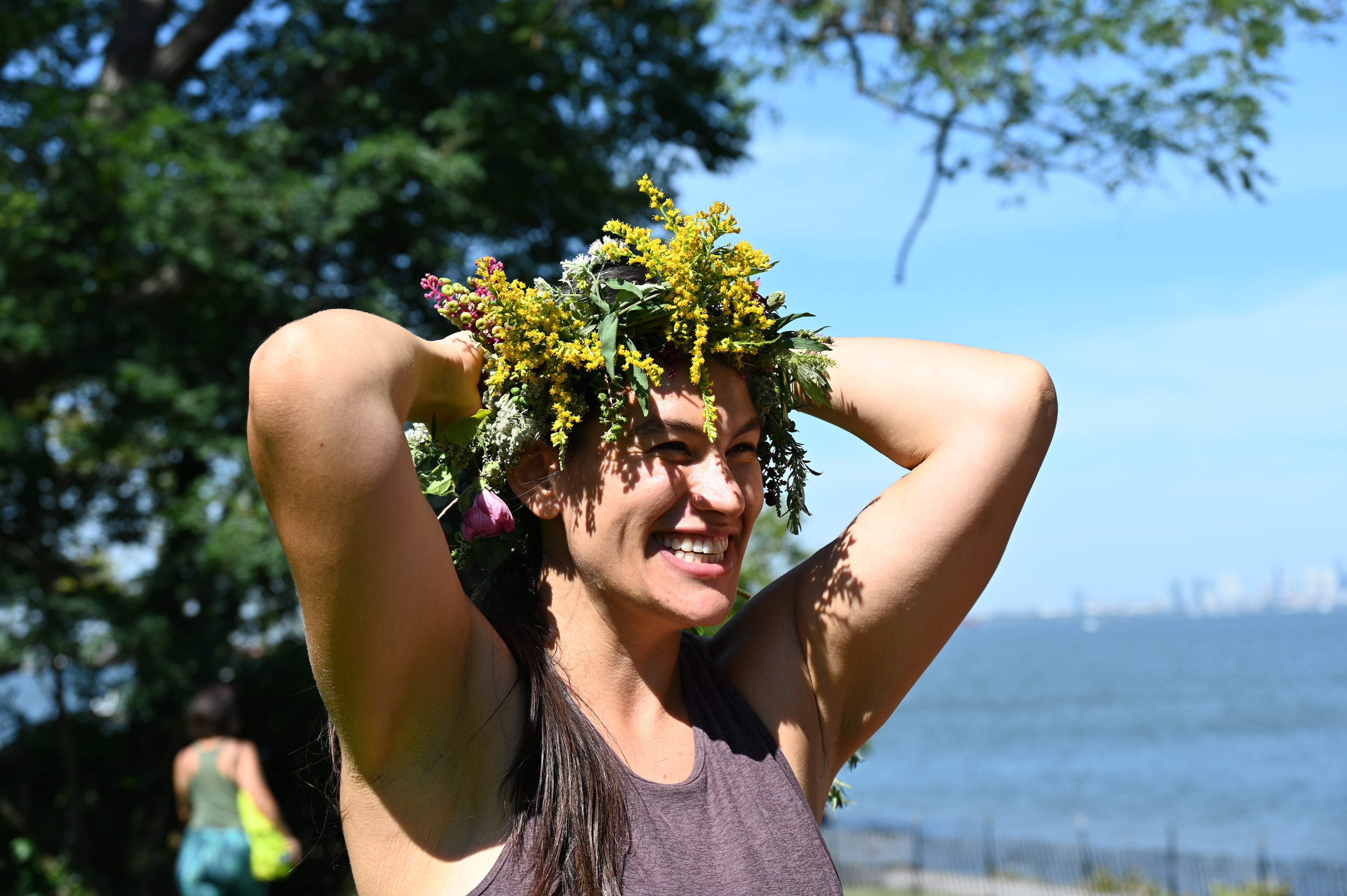 Glam Gardener in a floral headband made with regionally harvested plants like goldenrod and pokeberry