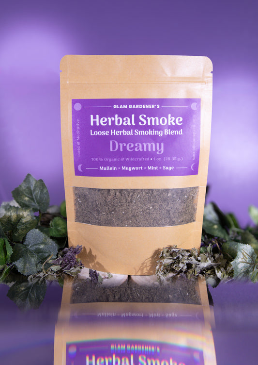 Glam Gardener NYC’s dreamy loose herbal smoking blend with Mullen, mugwort, mint, and sage. Featuring a purple background with dried mugwort and leaves. This herbal blend is wildcrafted and organic.