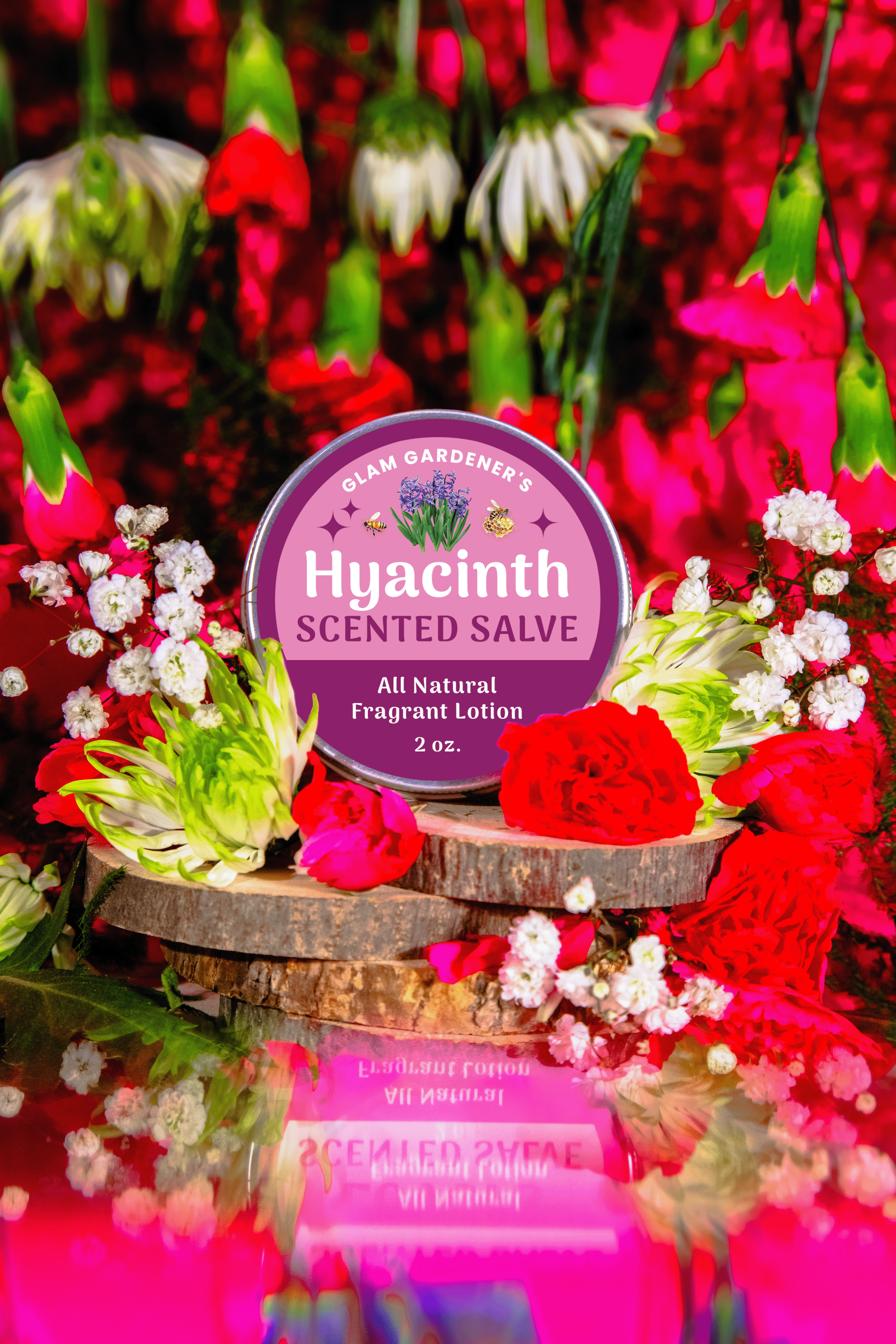 Hyacinth Blooms Scented Salve is Glam Gardener's Signature salve infused with authentic Hyacinth Absolute Oil. The label is a dual toned pink color and the backrgound showcases flowers. The salve contains a creamy solid perfume and hydrating lotion made with Olive Oil, absolute oil, and beeswax.