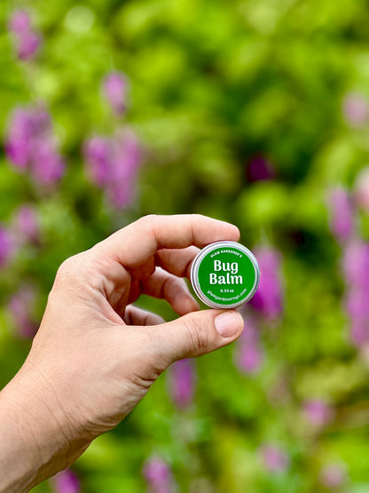 Miniature Bug repelling balm by Glam Gardener in small metal tin with green color.