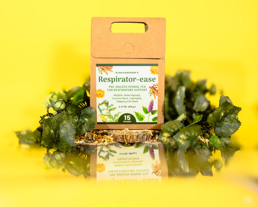 GLAM GARDENER'S Respirator-ease with Mullein, Anise Hyssop, Licorice Root, Calendula, Slippery Elm Bark. photograph is taken of our pre-bagged herbal tea with a reflective and dreamy look. The ingredients are grown in the USA.