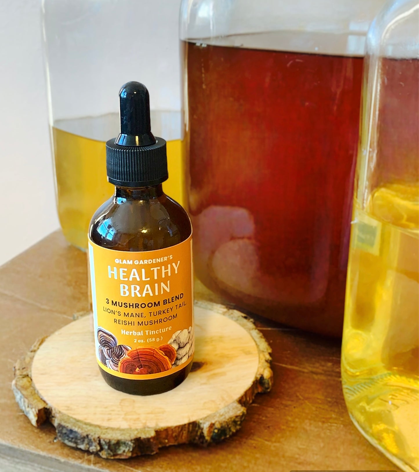 tincture with lion's mane turkey tail and reishi mushroom called healthy brain by glam gardener 