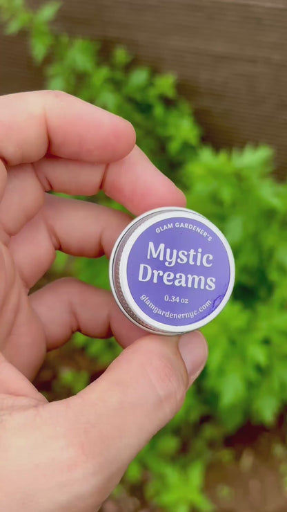 Mystic Dreams Mini Salve by Glam Gardener with Mugwort and Garden in Background. 