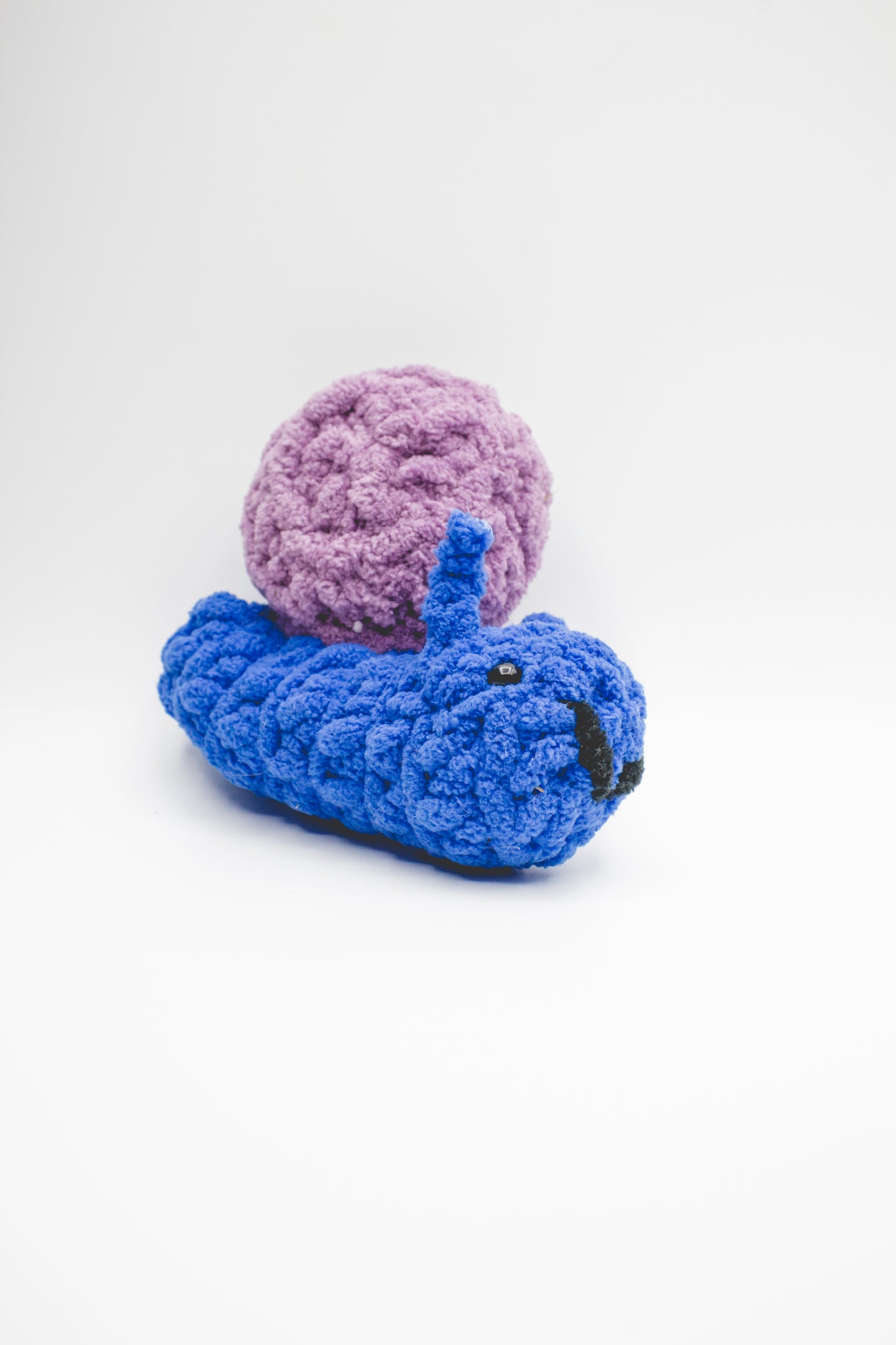 Snail hand-crocheted plushie